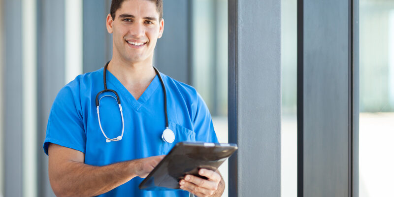 Doctor using clinical data management and EDC