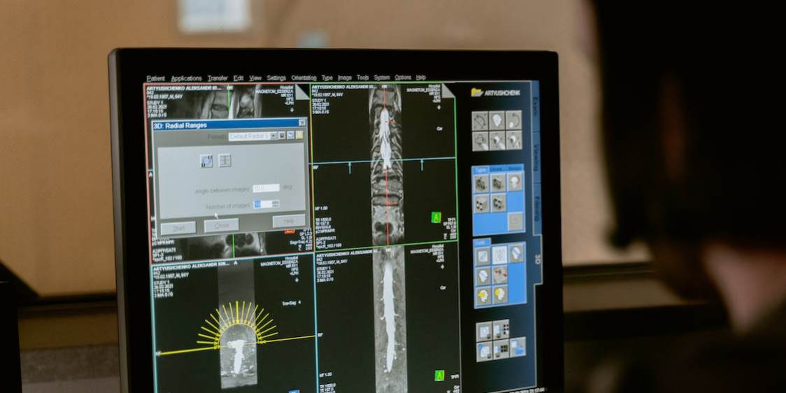 medical screening and reports on a monitor.