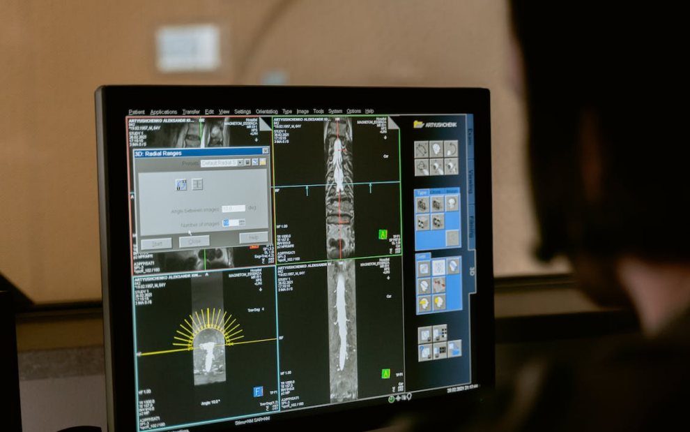 medical screening and reports on a monitor.
